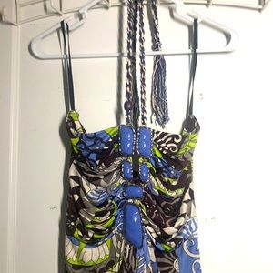 brown, green, white and blue patterned halter dress with blue jeweled neckline